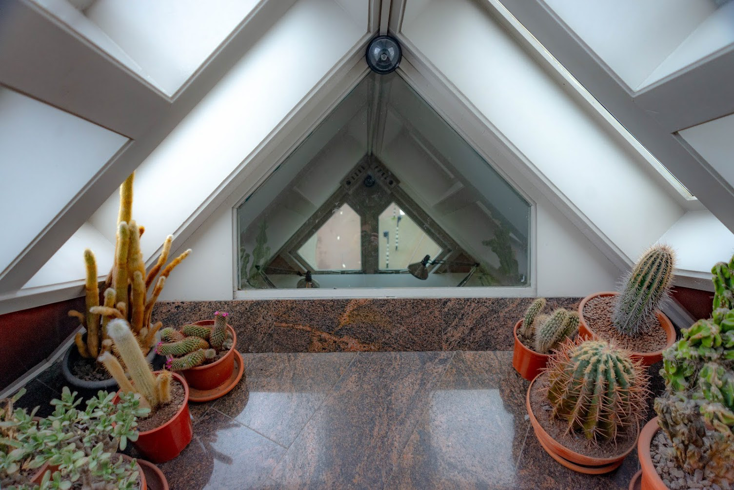 Within a home in the kubus haus, you can look down upon  the fietpad below, Rotterdam, NL